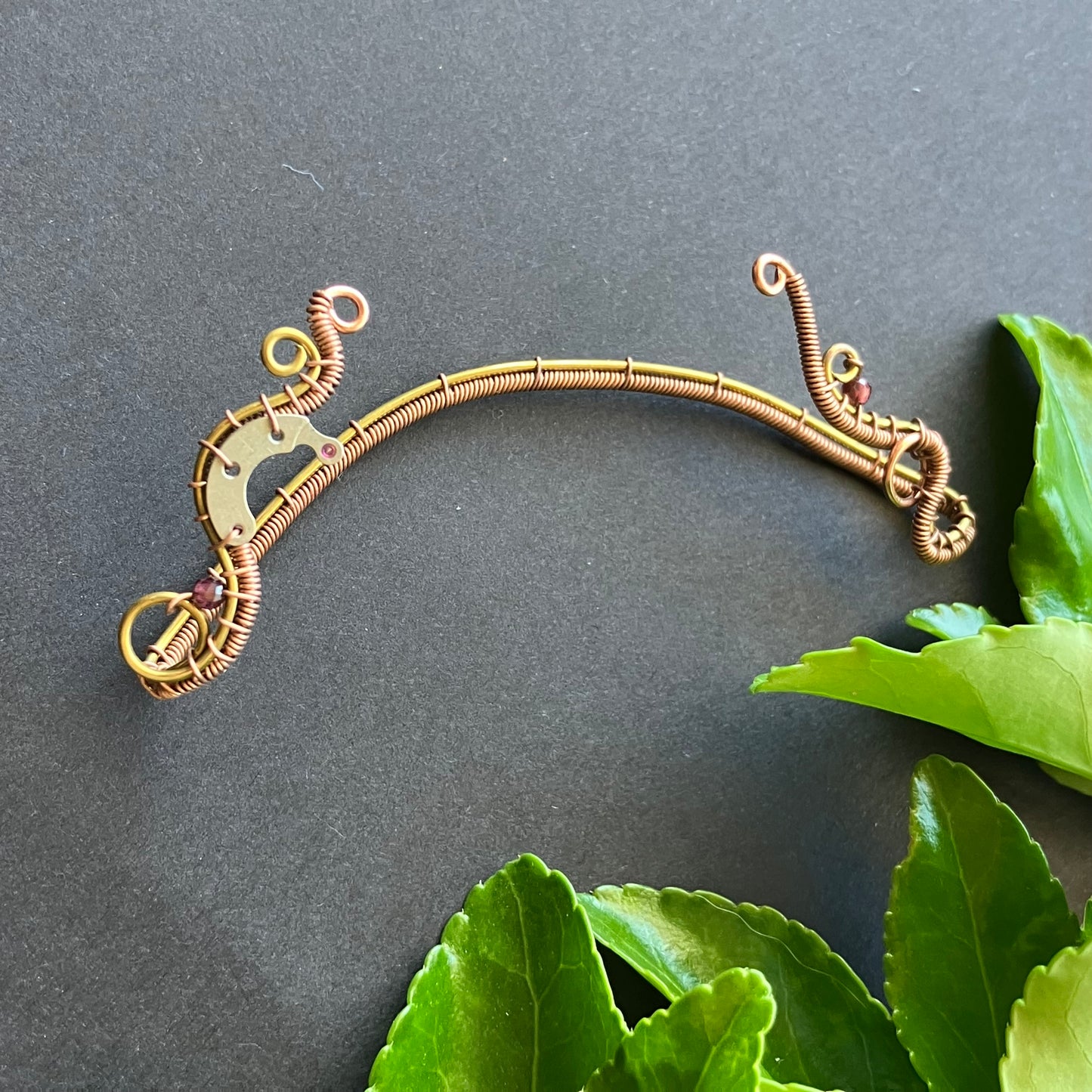 Brass and copper steampunk ear wrap with garnet