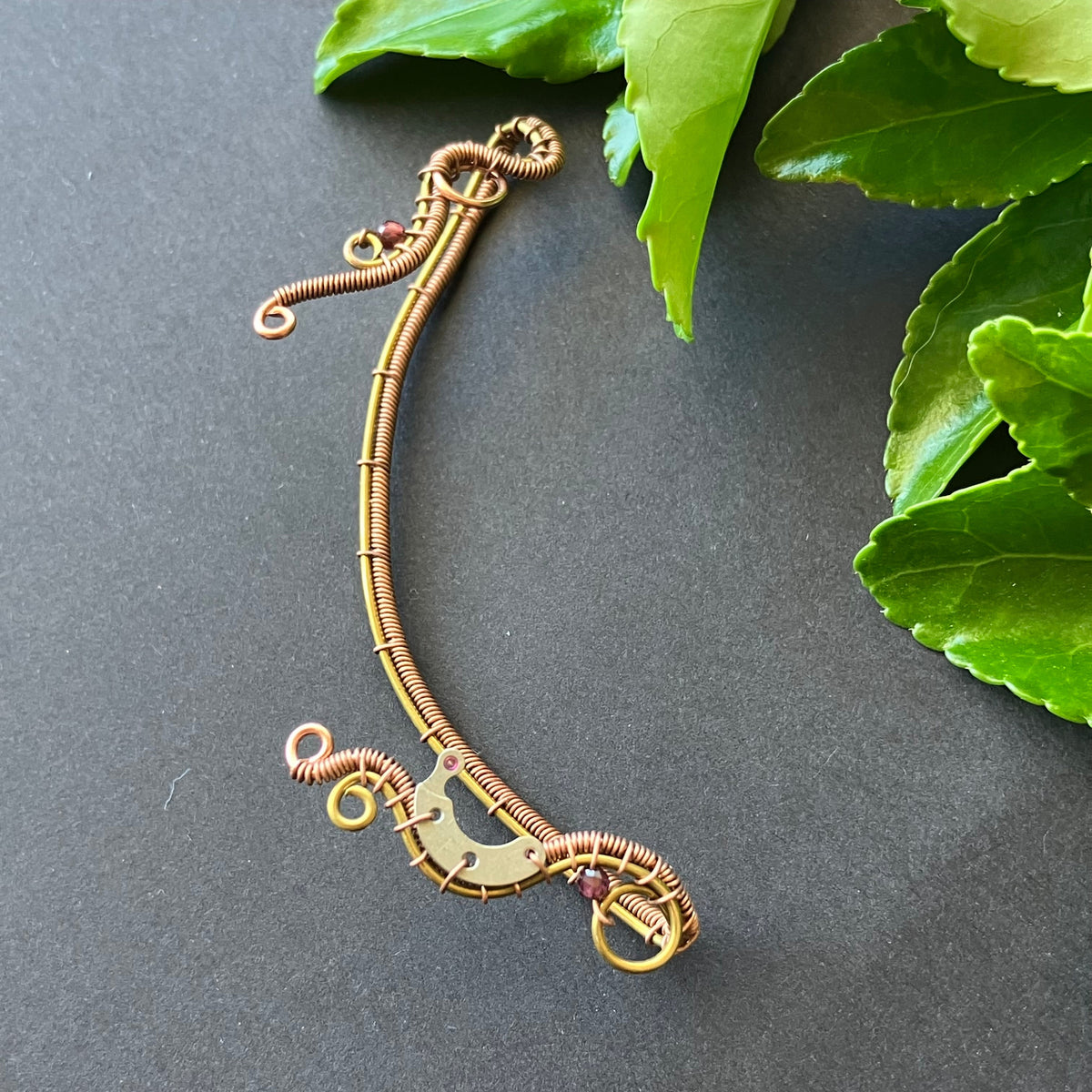 Brass and copper steampunk ear wrap with garnet