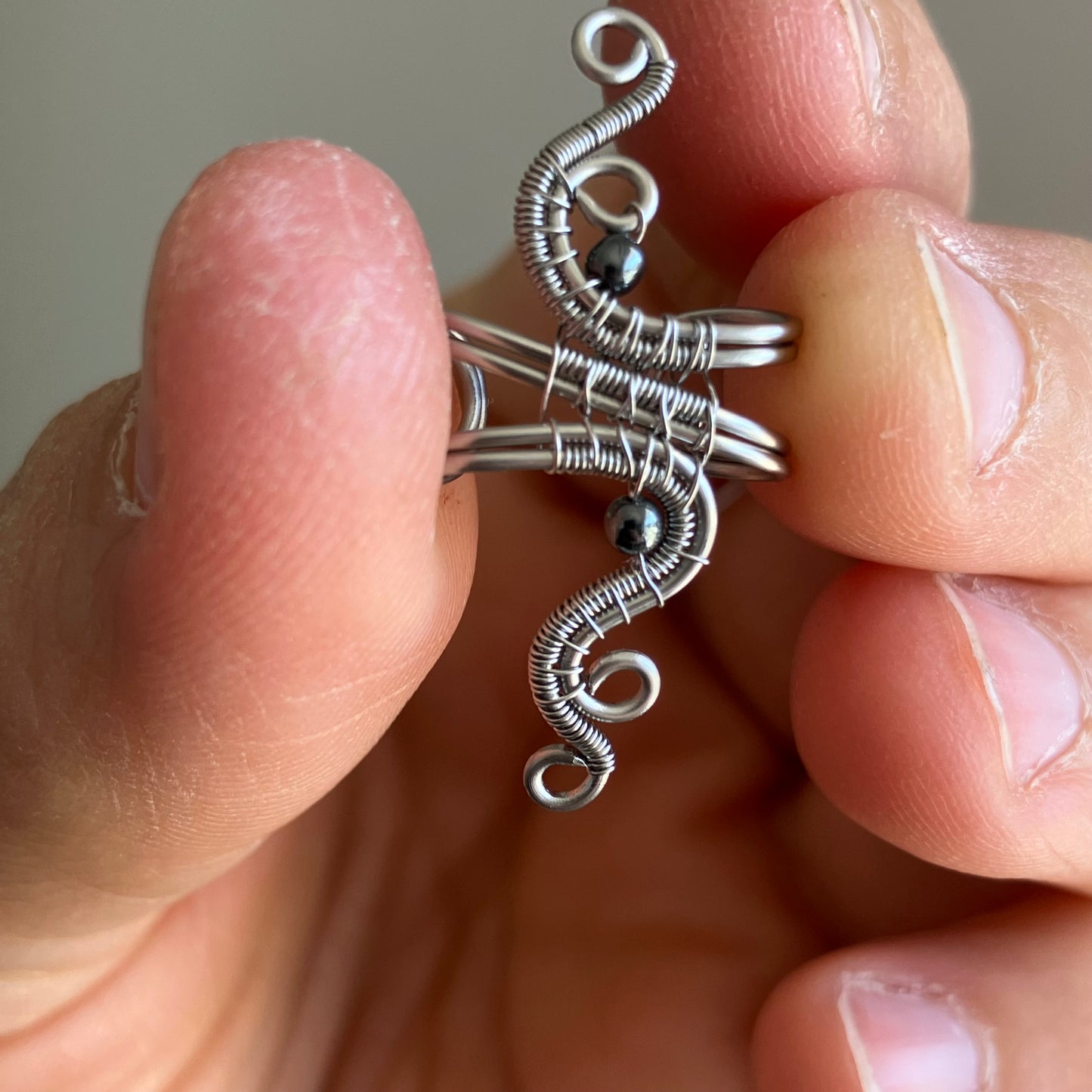 Stainless steel wire wrapped ear cuff