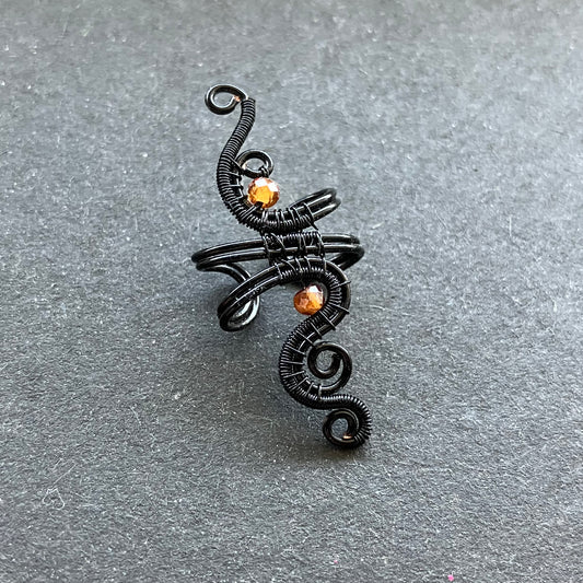 Phoenix black and hessonite ear cuff