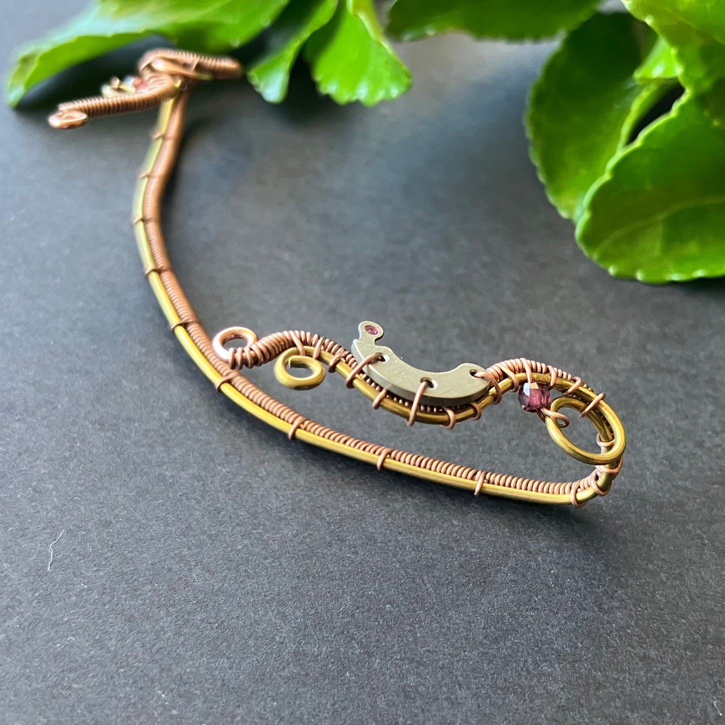 Brass and copper steampunk ear wrap with garnet