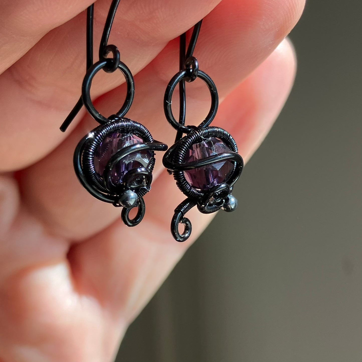 Black and purple earrings