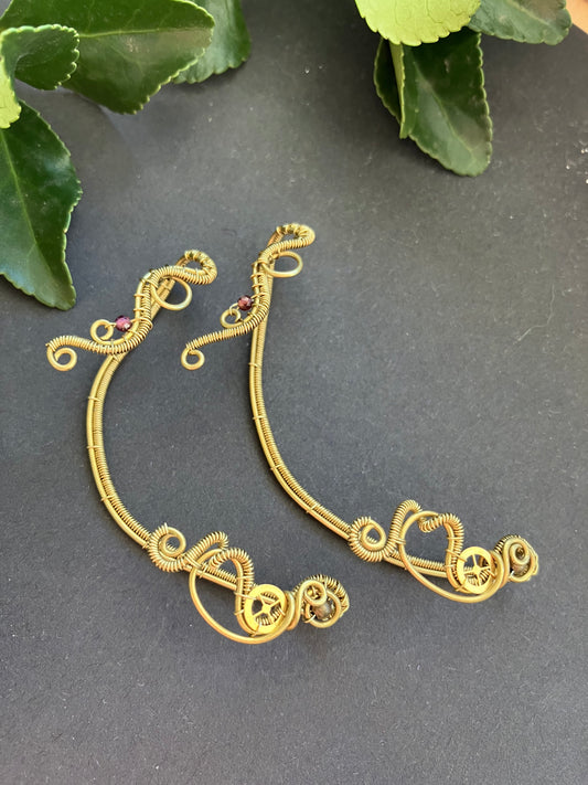 Brass steampunk ar wrap with garnet