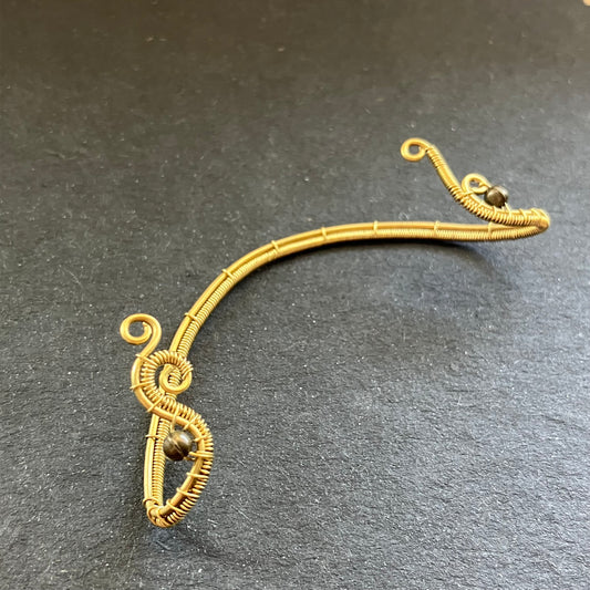 Wire wrapped brass ear wrap
