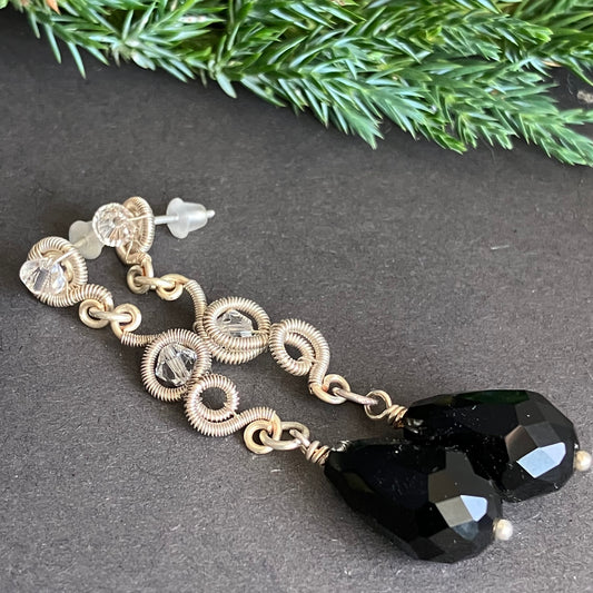 silver plated wire wrapped earrings with clear and black beads