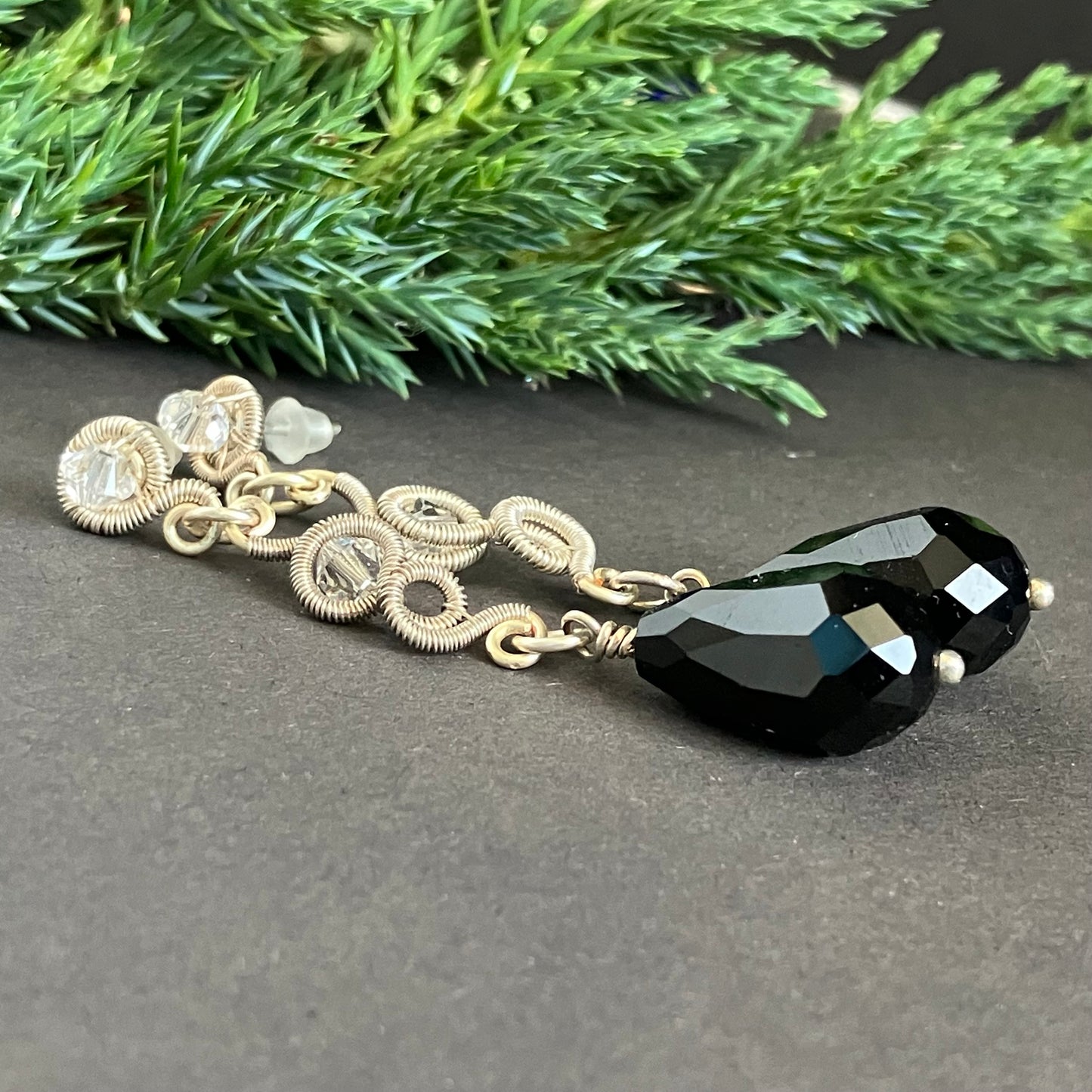 silver plated wire wrapped earrings with clear and black beads