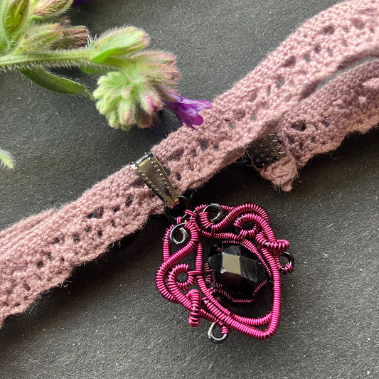 Pink and black choker