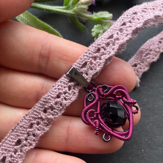 Pink and black choker