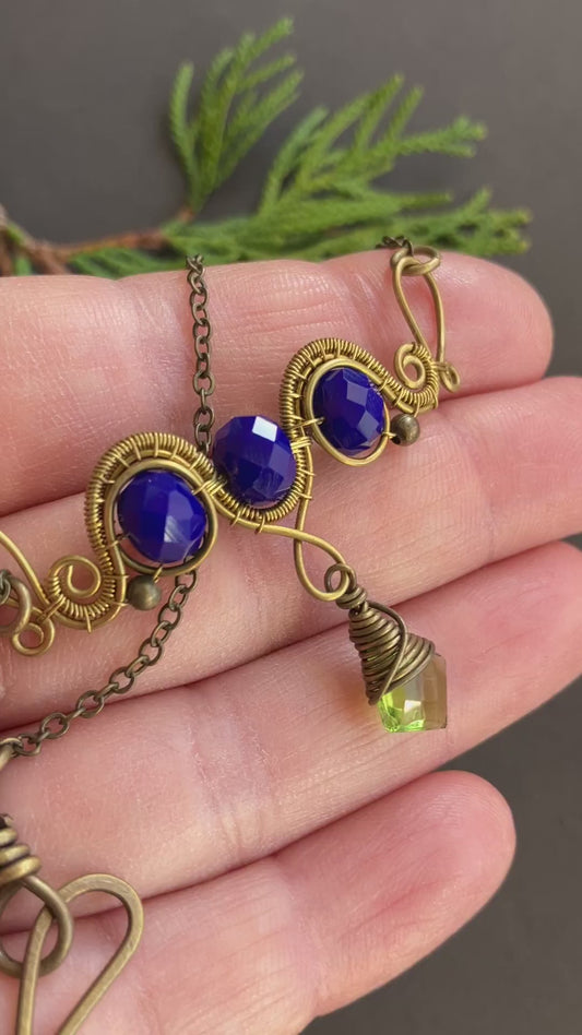 copper wire wrapped necklace with wide pendant blue and green beads