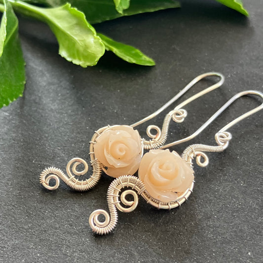 silver plated wire earrings with pale powder pink resin roses