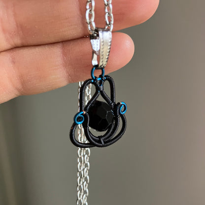 Blue and black necklace