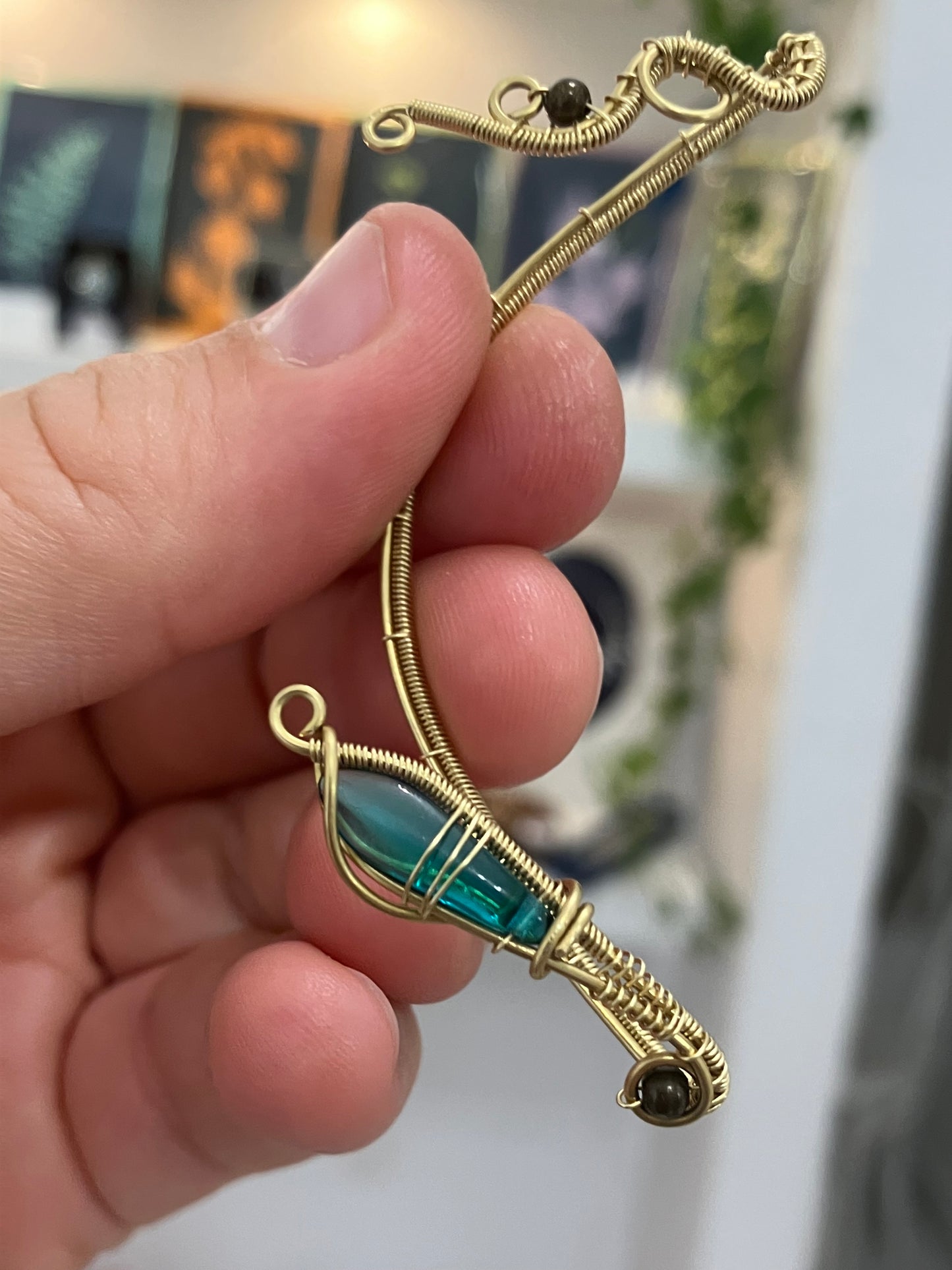 Brass teal ear wrap