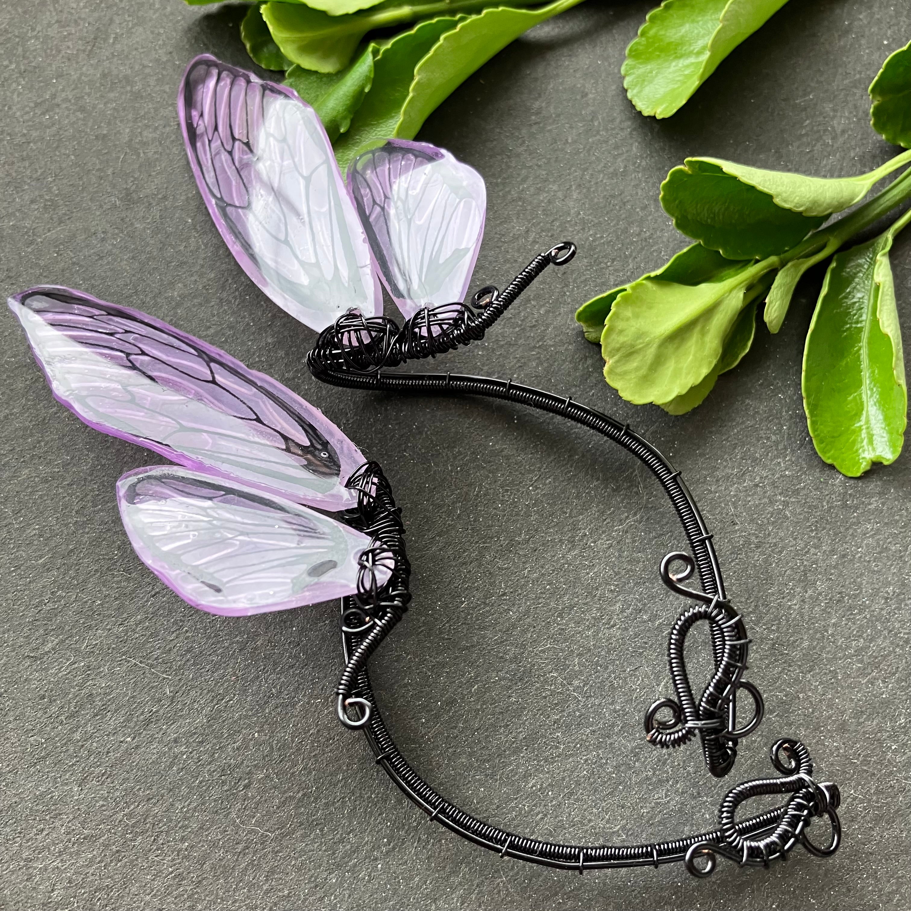 Fantasy headband with purple butterfly wings and intricate black design
