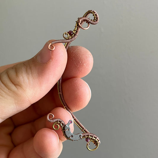 Brass and copper steampunk ear wrap with garnet