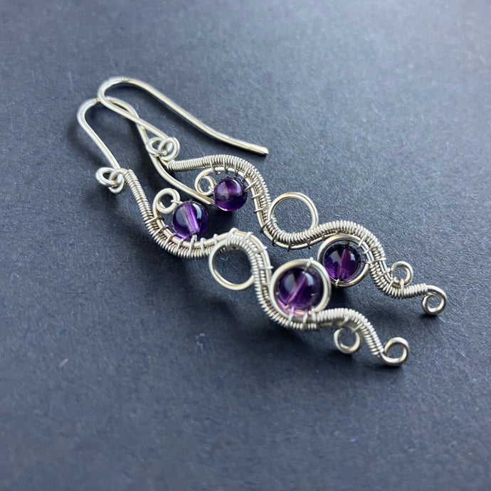 wire wrapped sterling silver earrings with amethyst beads