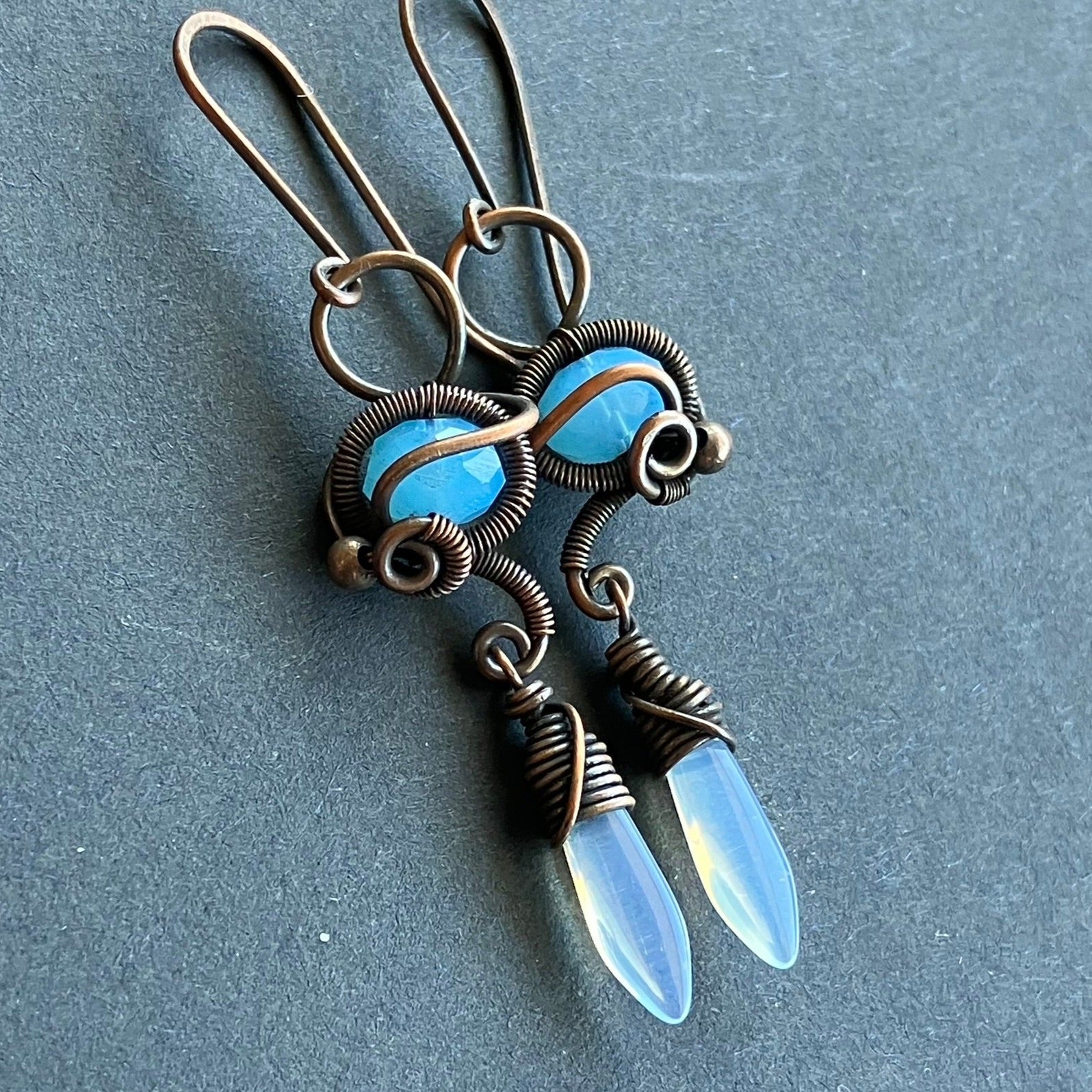 Copper earrings with blue and translucent beads