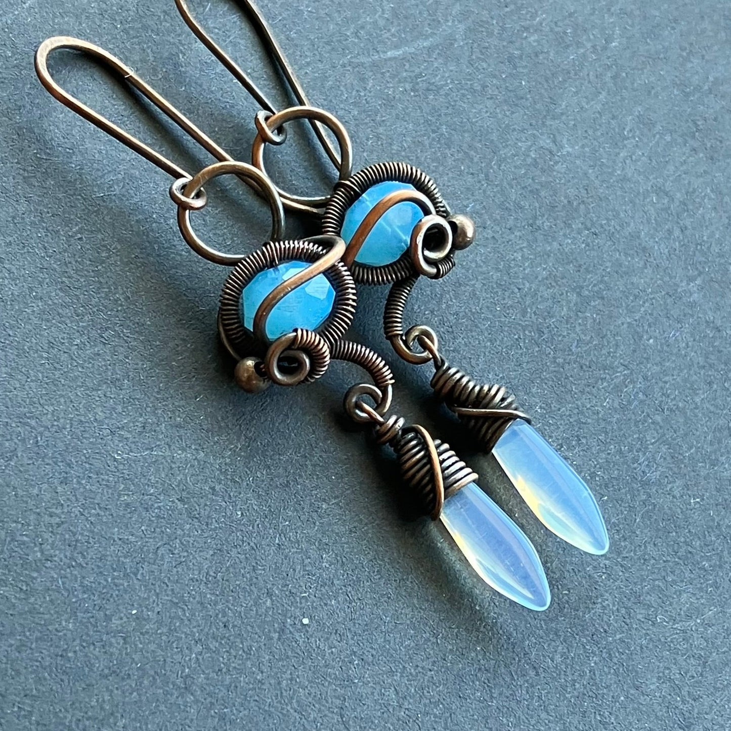 Copper earrings with blue and translucent beads