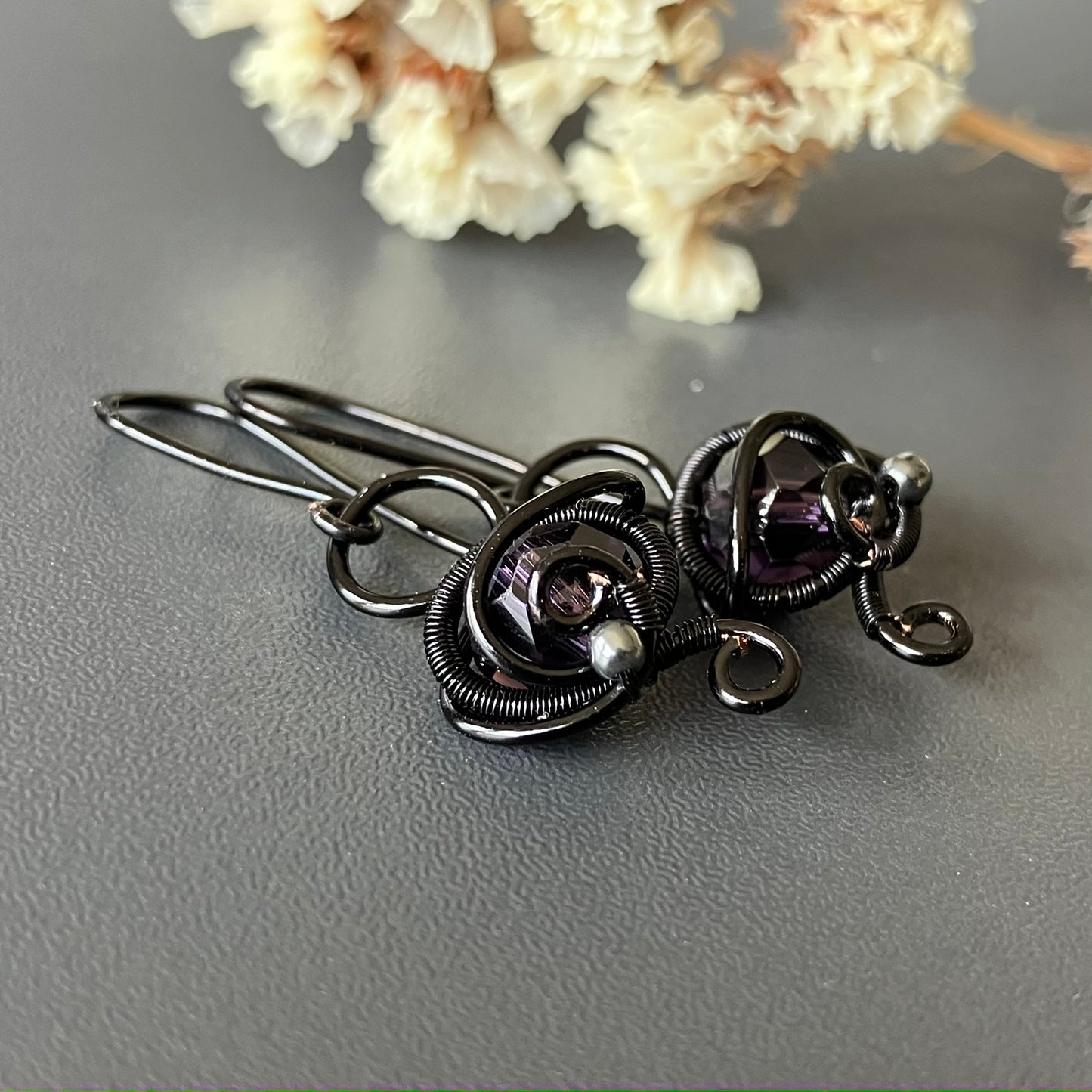 Black and purple earrings