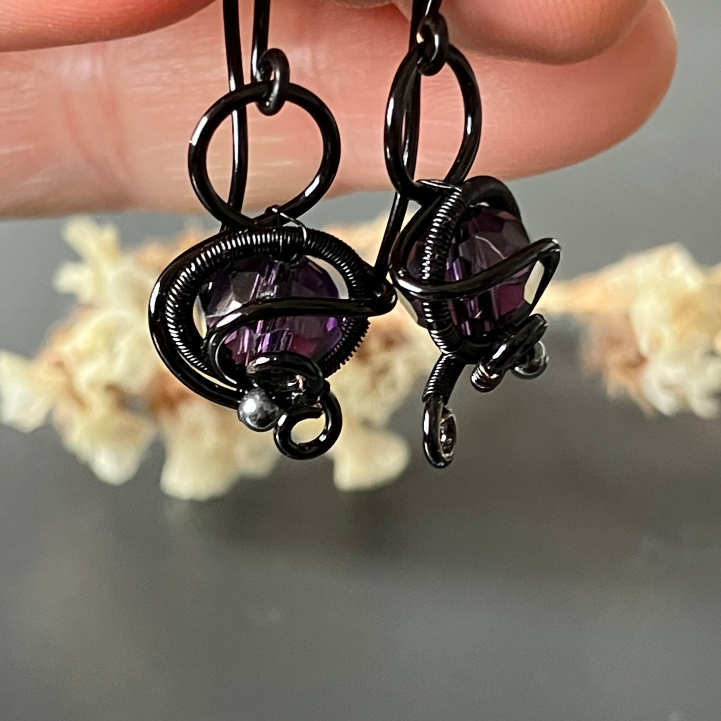 Black and purple earrings