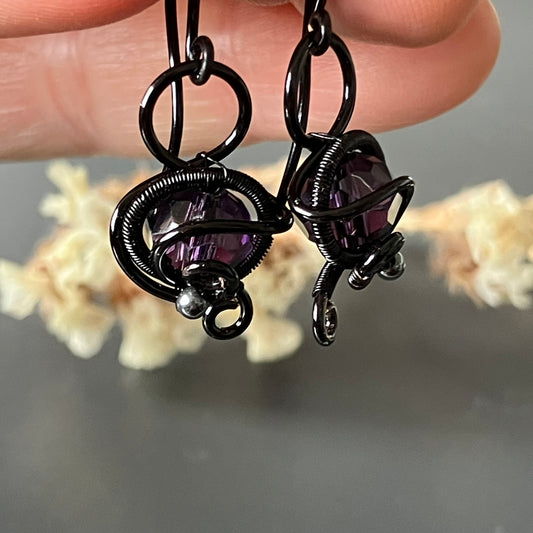 Black and purple earrings