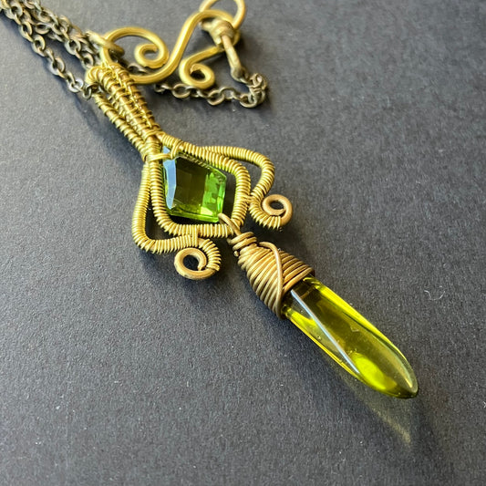Necklace with a green glass beads pendant