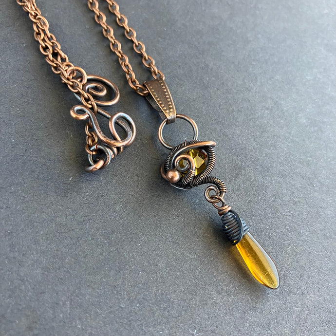 wire wrapped brass necklace with orage glass beads