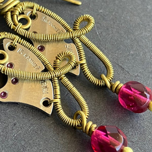 brass clockwork earrings with dark pink beads