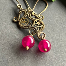 Load image into Gallery viewer, brass wire wrapped dangle earrings with gears and hot pink beads 
