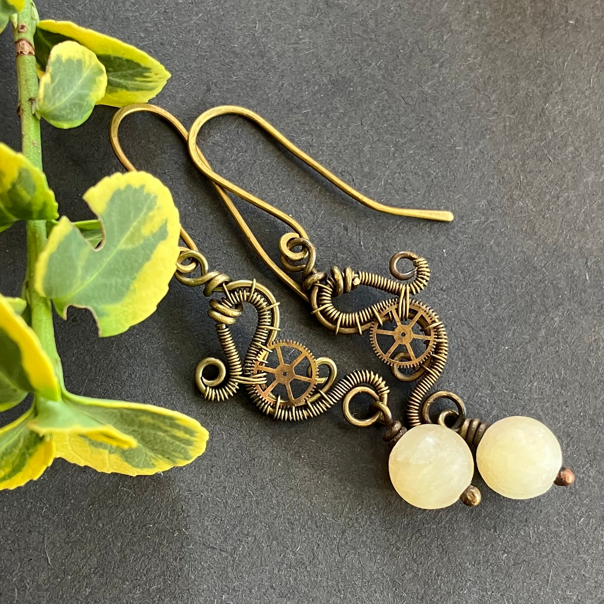 wire wrapped brass steampunk earrings with yellow jade beads