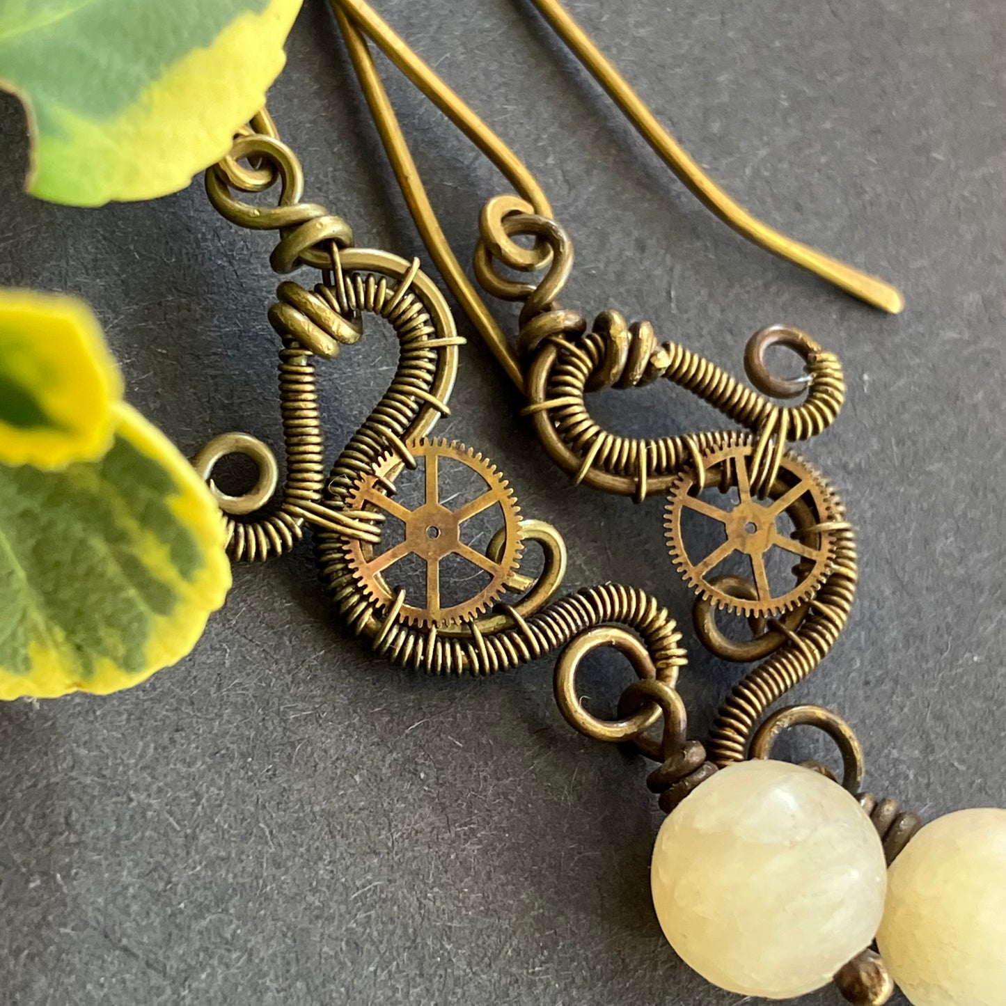 wire wrapped brass steampunk earrings with yellow jade beads