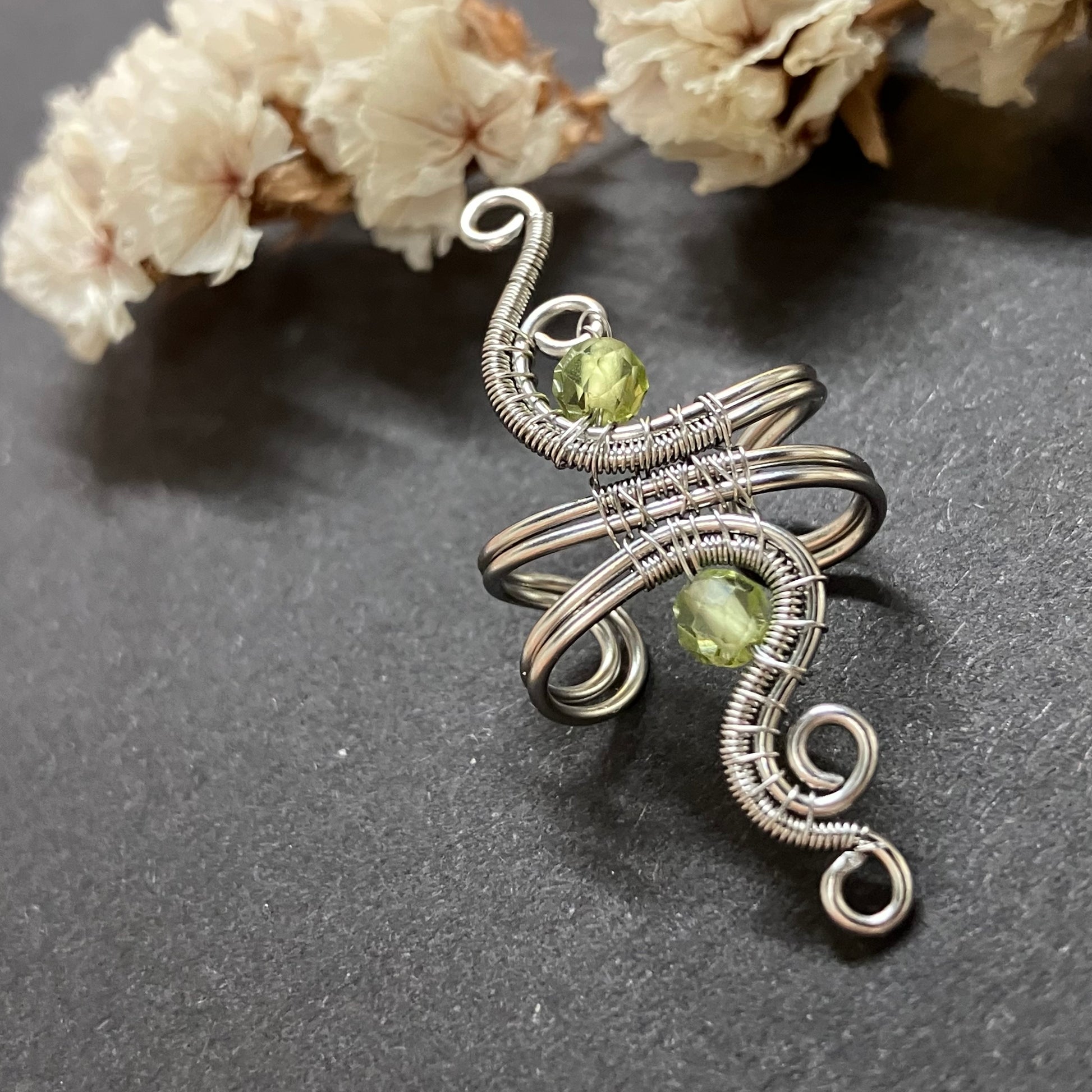 Stainless steel ear cuff with peridot
