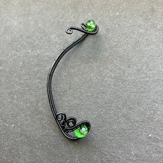 black and green wire wrapped ear wrap