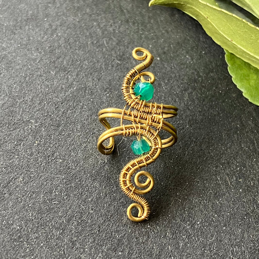 brass ear cuff adorned with green onyx stones