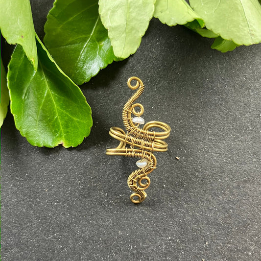 brass pearl ear cuff with intricate details