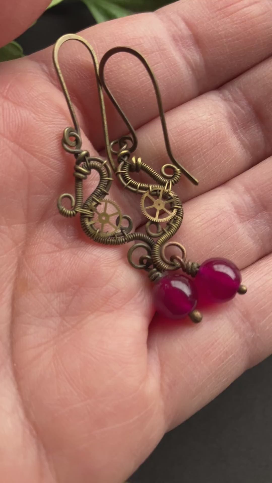 brass wire wrapped dangle earrings with gears and hot pink beads 