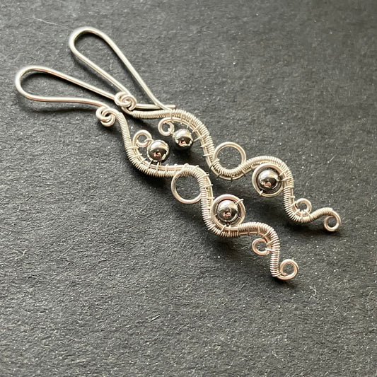 silver plated wire wrapped dangle earrings