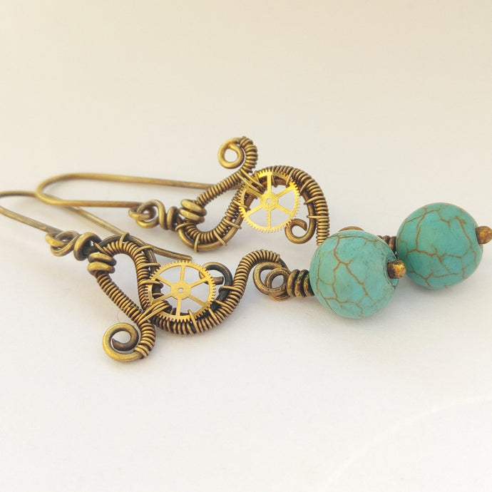 wire wrapped brass dangle earrings with turquoise beads