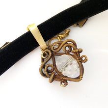 Load image into Gallery viewer, velvet choker with wire wrapped brass pendant and tranclucent faceted glass bead
