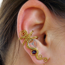 Load image into Gallery viewer, wire wrapped brass ear cuff with a silver gear and a purple swarovski bead
