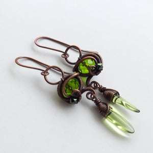 goblincore copper wire wrapped dangle earrings with green beads 