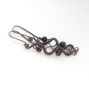 wire wrapped silver dangle earrings with blue sandstone beads