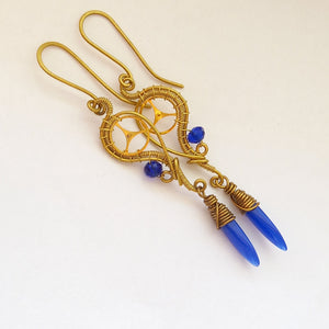 brass wire wrapped dangle earrings with blue beads