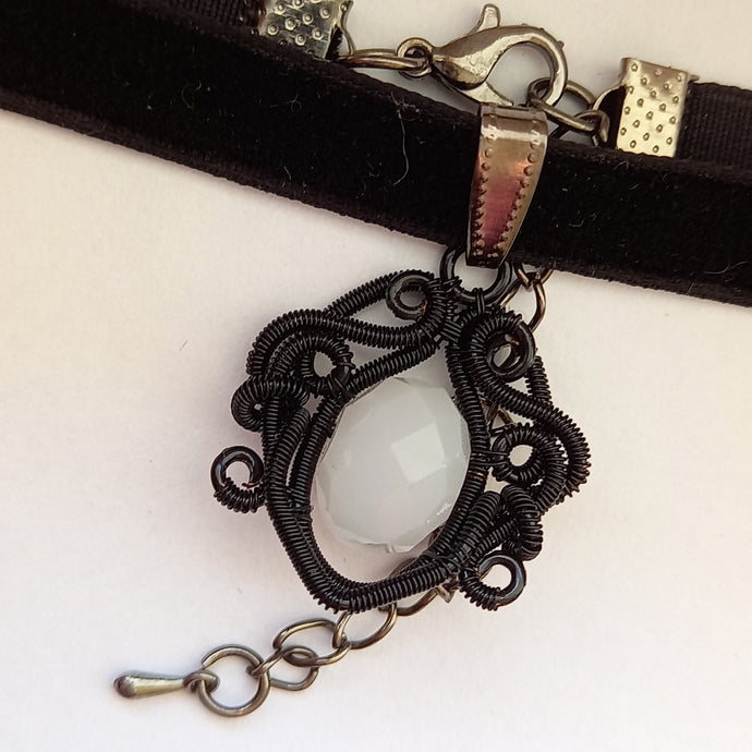 gothic black wire wrapped pendant with white glass bead on black velvet choker