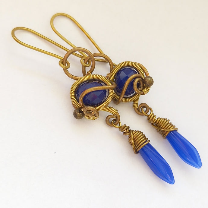 brass wire erapped earrings with blue beads