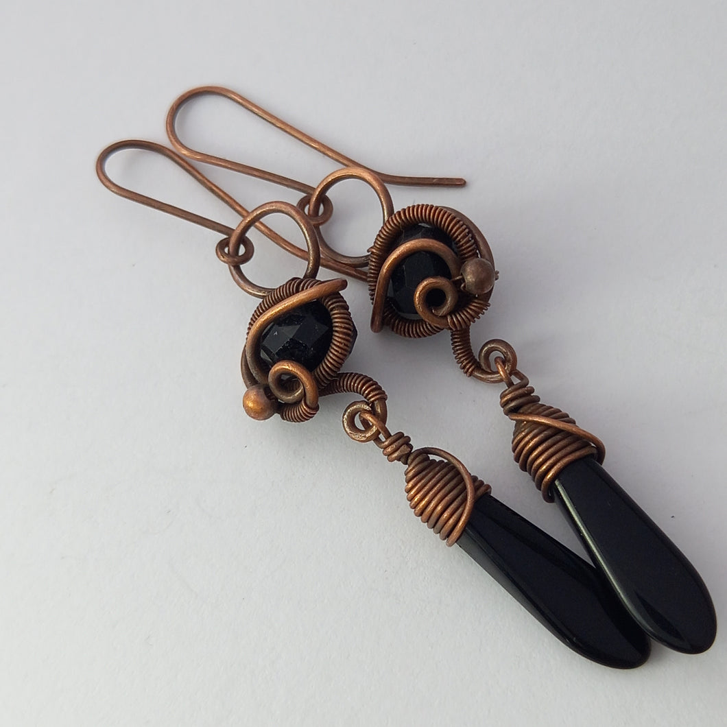 wire wrapped copper dangle earring with black beads