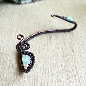 copper wire wrapped ear wrap with mint green beads