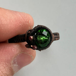 dark academia wire wrapped copper ring with green glass stone